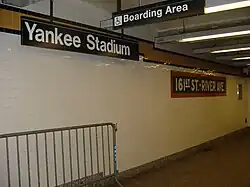 Modern sign next to an original-style mosaic