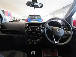 Dashboard of right-hand drive car with manual gearbox and rotary climate controls