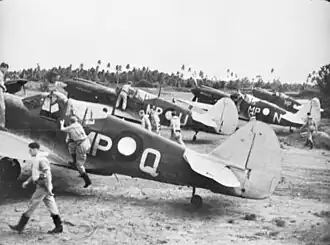 No. 86 Squadron RAAF about to take off in their Kittyhawk fighters at Merauke in April 1944