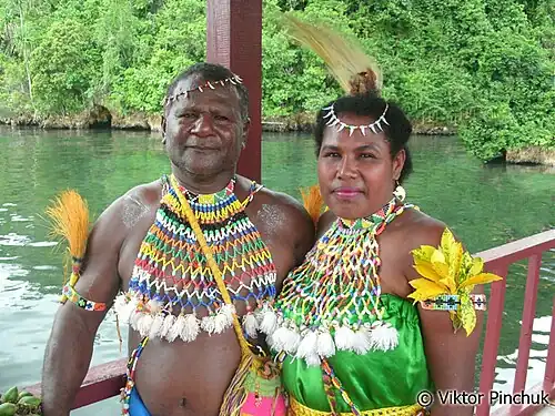 Newly married Kayu Batu couple in Jayapura, Indonesia.