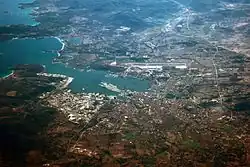 November 2014 aerial photograph of Olbia. The airport and the harbour are both visible.