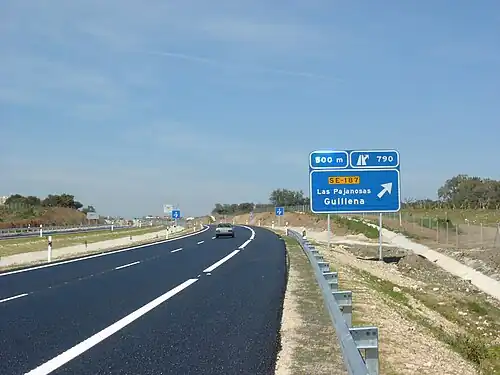 Modern autovías such as the A-66 near Guillena, Seville, offer most, if not all, features that are required by an autopista