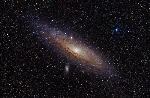 Image 20 Andromeda Galaxy Photo: Adam Evans The Andromeda Galaxy is a spiral galaxy approximately 2.5&nbsp;million&nbsp;light-years away. The image, created using a hydrogen-alpha filter, also shows Messier objects 32 and 110, as well as NGC 206 and the star Nu Andromedae. On December 15, 1612, German astronomer Simon Marius became the first person to describe the galaxy using a telescope. More selected pictures