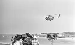 An MD 500 Defender multi-role helicopter of 190 Squadron "Magic Touch" during an air show in 1981