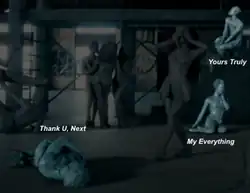 Three statues that emulate Grande's poses for the cover artworks of Yours Truly, My Everything, and Thank U Next