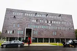 BSB operators abseiling from the roof of the new headquarters at Camp New Amsterdam, in 2015