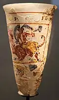Goblet showing The Rape of Europa and of Ganymede, part of the Bagram Treasure; 1st century AD; painted glass; height: 16&nbsp;cm, diameter: 10&nbsp;cm; Guimet Museum (Paris)[84]