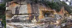 The Beehive Casemate (designed by James Barnet) was carved into the cliff face at Obelisk Bay in Sydney Harbour around 1871