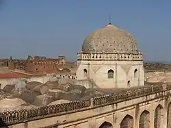 The smaller domes on the roof are hidden from view by the parapet wall