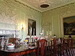 The dining room. The Dining Room was converted from the 16th century Great Hall by the second Duke as he turned the old castle into a Georgian mansion house Thomas Clayton’s plasterwork can be seen here and throughout much of the castle.