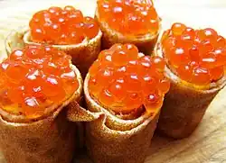 Blini with red caviar