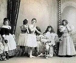 Another image of cast members from act II/scene 1. From left to right: an unknown cast member as a servant, Pierina Legnani as Ysaure de Renoualle, Sergei Legat as Arthur, and Olga Preobrajenskaya as Anne de Renoualle.