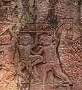 Knee attack stone carving at Bayon temple(12th/13th century)