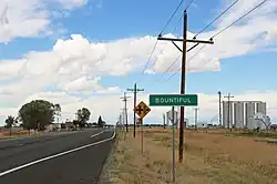 Entering from the south along Highway 285.