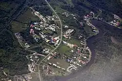 An aerial view of the village, divided by Jalan Tanjong Maya