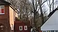 Bruno's Field is hidden behind houses, and this is a view of trees in the field from Worcester Crescent