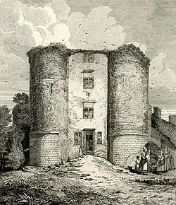 front view of two crumbling stone towers, with dramatic clouds and some peasants in the corner