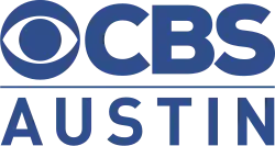 In blue, the CBS eye and the letters C B S above a line and the word Austin in a sans serif.