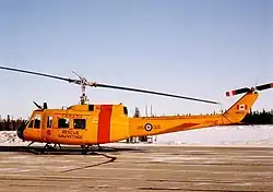 Base Flight Cold Lake CH-118 Iroquois helicopter 118103 at CFB Cold Lake, January 1992.