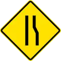 PF-1b Road narrows ahead on right side