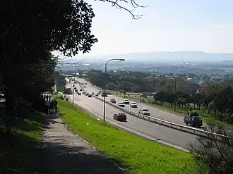 The M3 highway that separates the Upper Campus and Middle Campus; a tunnel beneath the highway connects the two campuses.