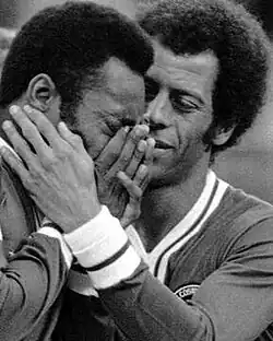 Carlos Alberto comforting Pelé