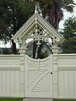 Victorian fencing and gate in the side yard of the Milton Carson Home