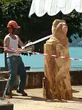 A man carving a Bernese bear with a chainsaw in Brienz, Switzerland