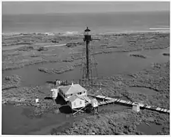 The light in 1960. Note how much more land there is than in 1971.