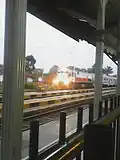 The Bandung Raya local train arrives at Cicalengka station