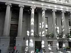 Columns on the bottom half of the building