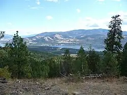 Colville National Forest with a lake and mountains.