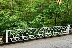 Interlocking Gothic arches on bridge over India Brook