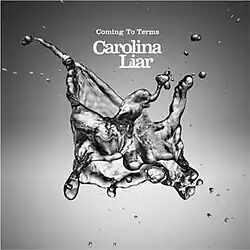 The cover consists of a black-and-white image of a liquid blob. The album title and band's name appear above the blob, colored in white.