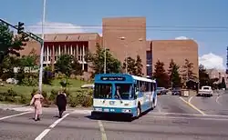 A Community Transit bus turning a corner to leave the University of Washington campus