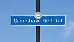 Crenshaw neighborhood sign located at the intersection of Crenshaw Boulevard & Slauson Avenue.