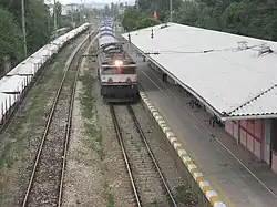 The eastbound train passing Tuzla station.