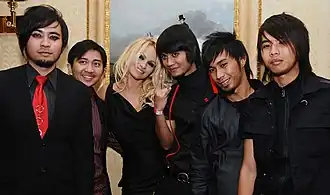 D'Hask with Pamela Anderson in 2009.