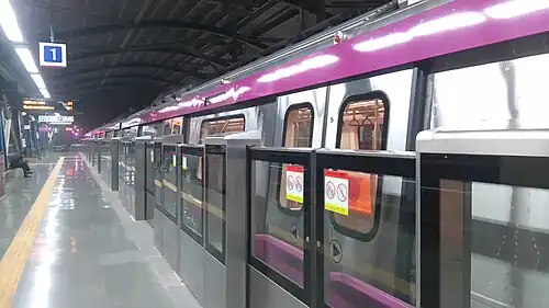 Half-height automatic platform doors in Okhla Bird Sanctuary Station of the Delhi Metro's Magenta Line
