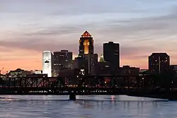 Des Moines skyline at dusk, with the 801 Grand (center) lit up