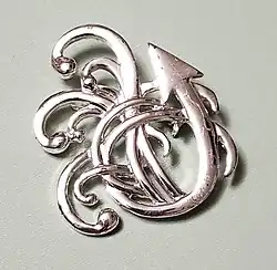 Silver Arrow, the symbol of the Dillon administration in the form of a pin.
