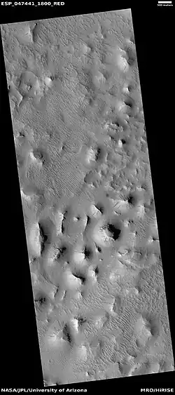 Wide view of layered buttes and small mesas, as seen by HiRISE under HiWish program Some dark slope streaks are visible. Location is Aeolis quadrangle. Note: Parts of this image are enlarged in next three pictures.