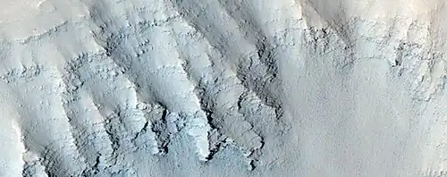 Close view of layers in the Louros Valles, as seen by HiRISE under HiWish program; this is an enlargement of a previous image.