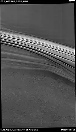 Layers in northern ice cap with an angular unconformity, as seen by HiRISE under HiWish program