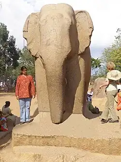 Elephant sculpture amongst the rathas