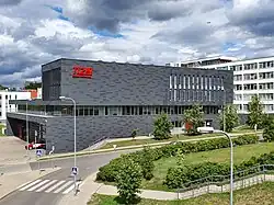 Exterior of a large, gray, modern building