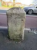 London Road milestone opposite Figges Marsh, looking east