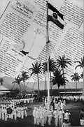 The German colonial flag is raised, 1 March 1900