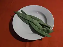 Flat beans are often eaten in India, normally cooked and served as whole pods.