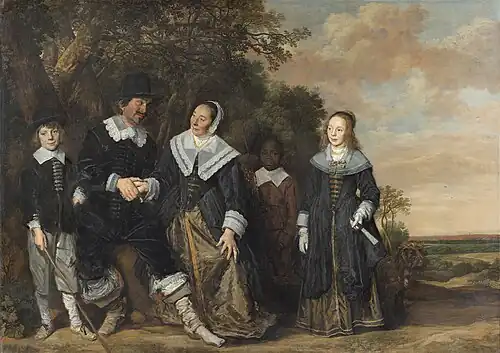 Domestic slave at the center of the composition of "Family Group in a Landscape" (1645-1648) by Fran Hals, now in Thyssen-Bornemisza National Museum, Madrid.